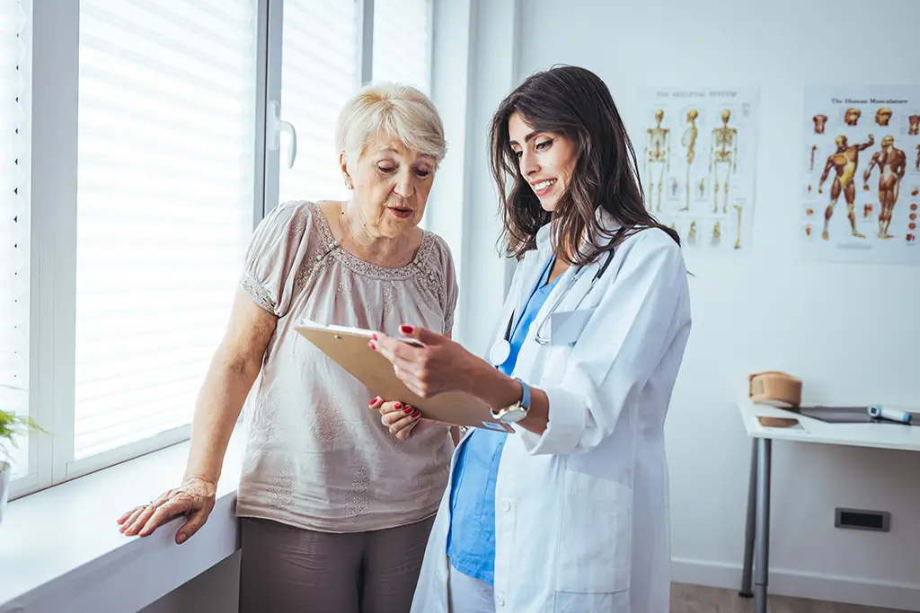 woman talking to doctor